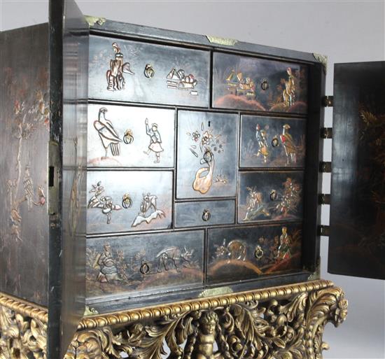 An early 18th century japanned cabinet, by repute formerly the property of Clive of India, W.3ft 10in. D.2ft H.5ft